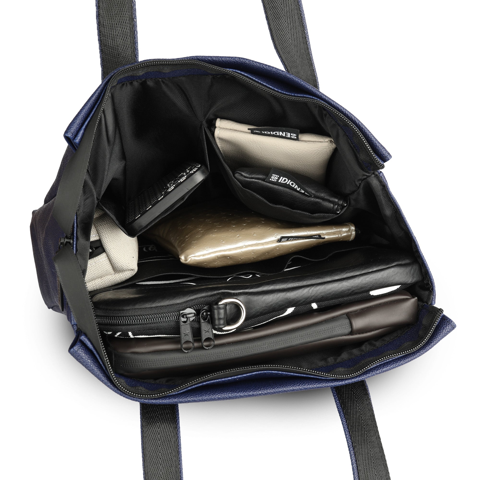 פנים תיק נינה של Zendigi המציג חלוקת תאים חכמה, כולל תא לאייפד, כיסים לאביזרים וארגון פנימי מקסימלי.