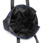 חלוקה פנימית בתיק זנדיגי מדגם נינה, המדגימה נפח אחסון גדול למחשב נייד, טאבלט וחפצים אישיים בסידור נוח.