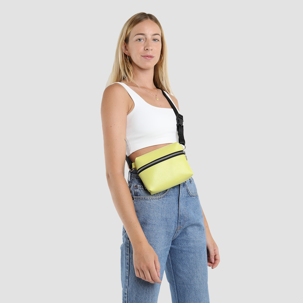 A girl wearing Zendigi Classic Yellow Zipack 100% vegan bag urban design made it TLV Tel aviv city